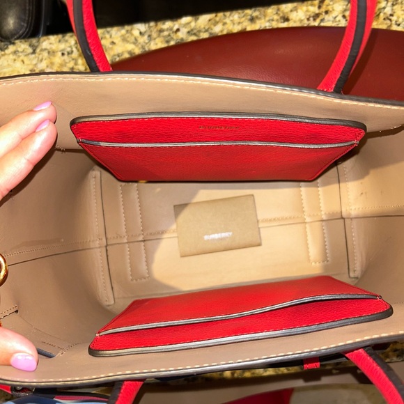Authentic Burberry medium-sized tote in red, featuring gold studs on the front. - Picture 7 of 11
